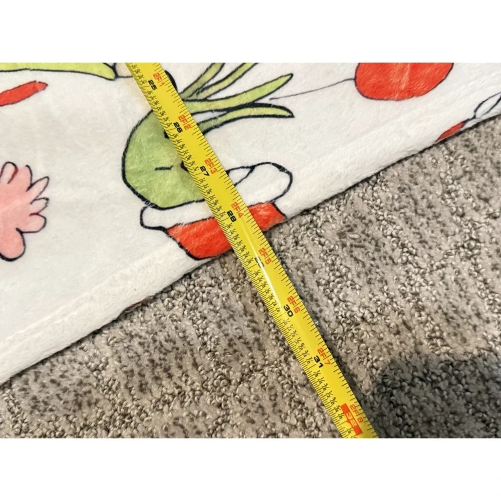 Dr. Seuss The Grinch throw blanket is made of super soft flannel fleece 40